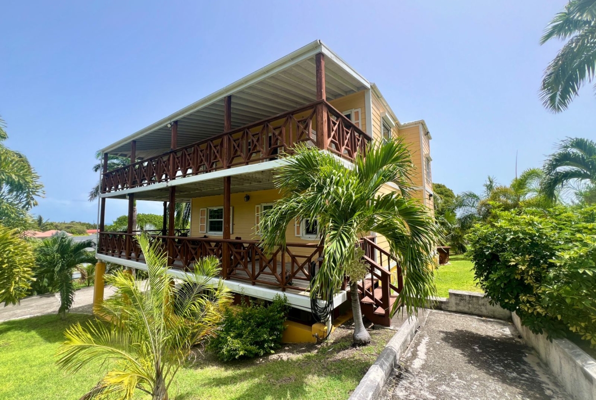 Yellow Palm House for Sale in Antigua