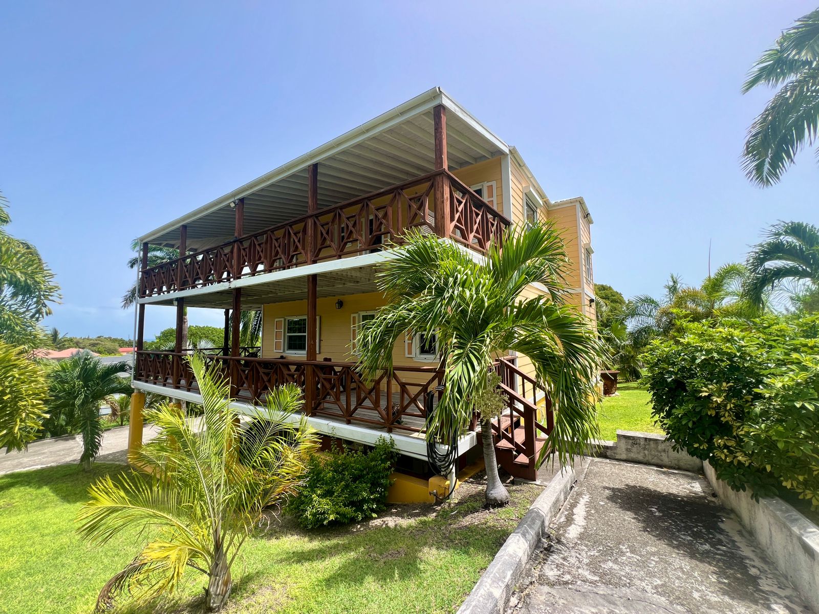 Yellow Palm House for Sale in Antigua