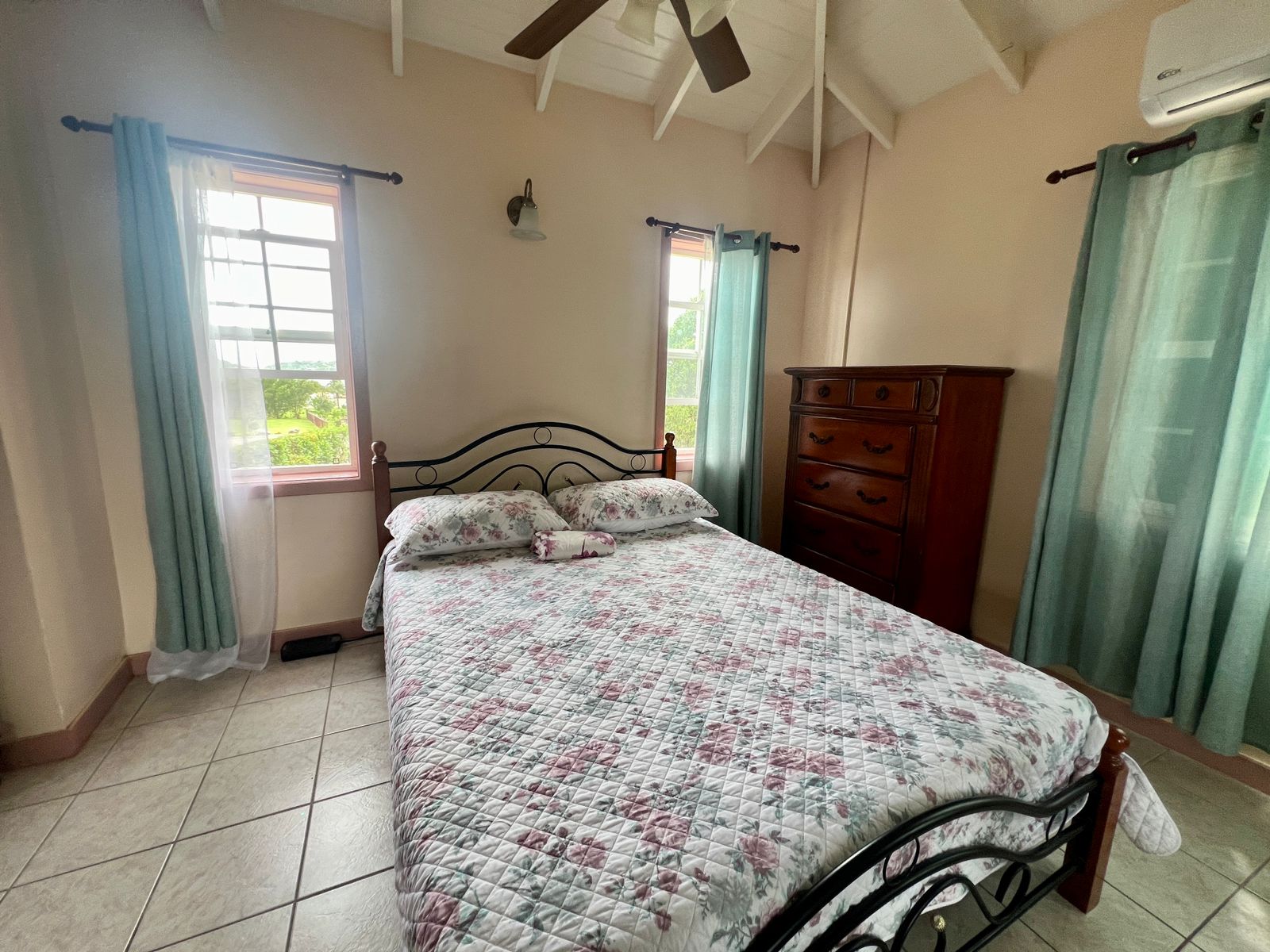 Master bedroom with private balcony overlooking the harbour