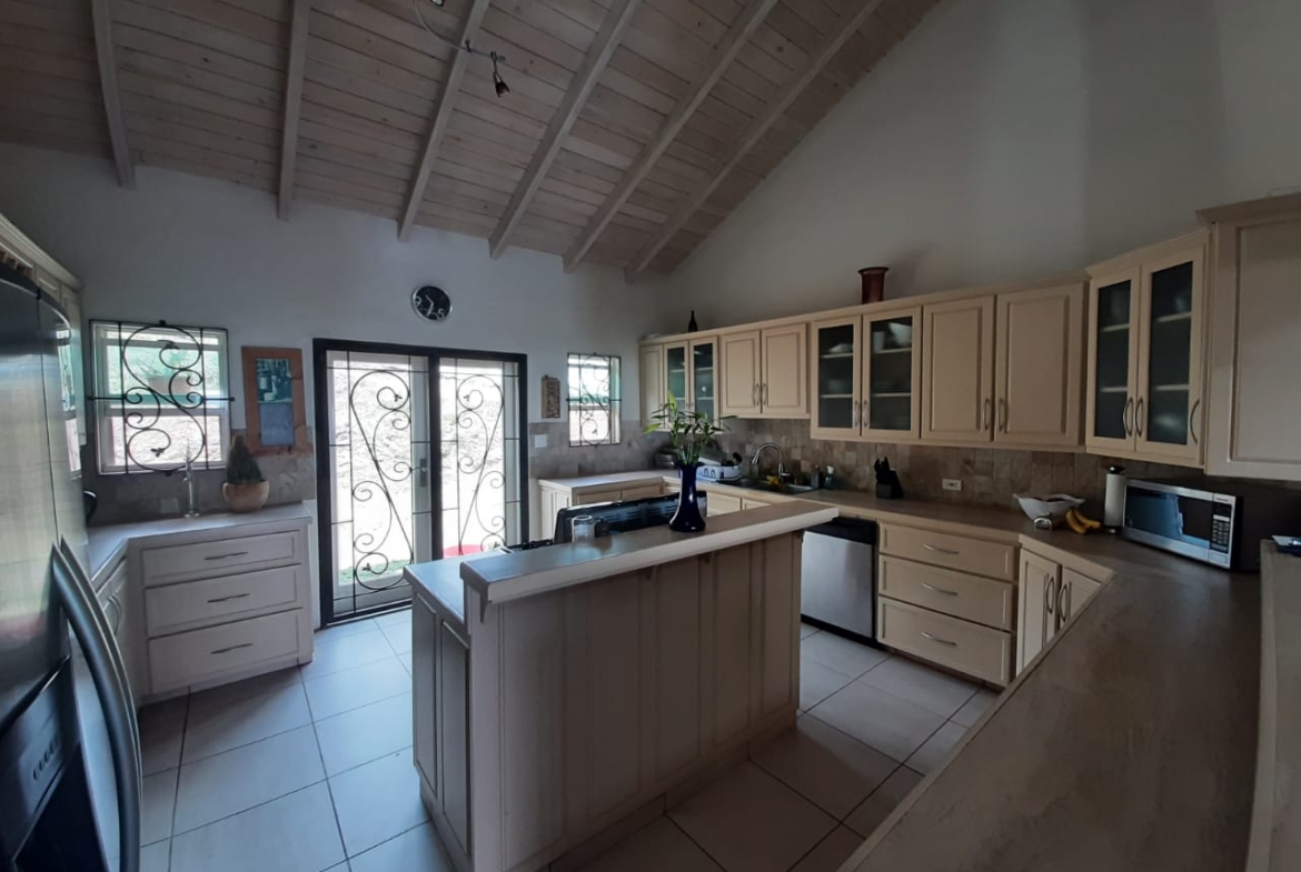 Well-equipped kitchen with contemporary appliances in Antigua rental property