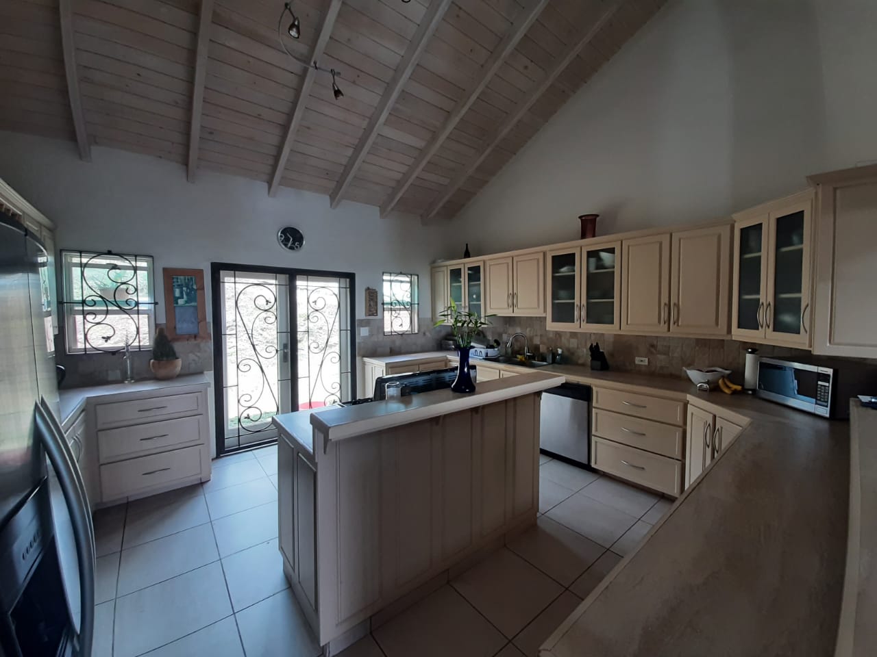 Well-equipped kitchen with contemporary appliances in Antigua rental property