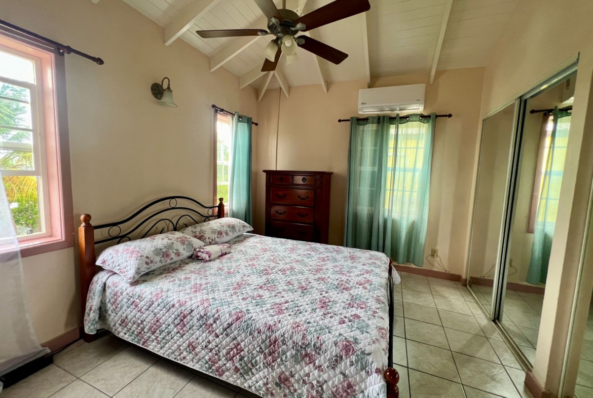 Bedroom with private balcony overlooking the harbour